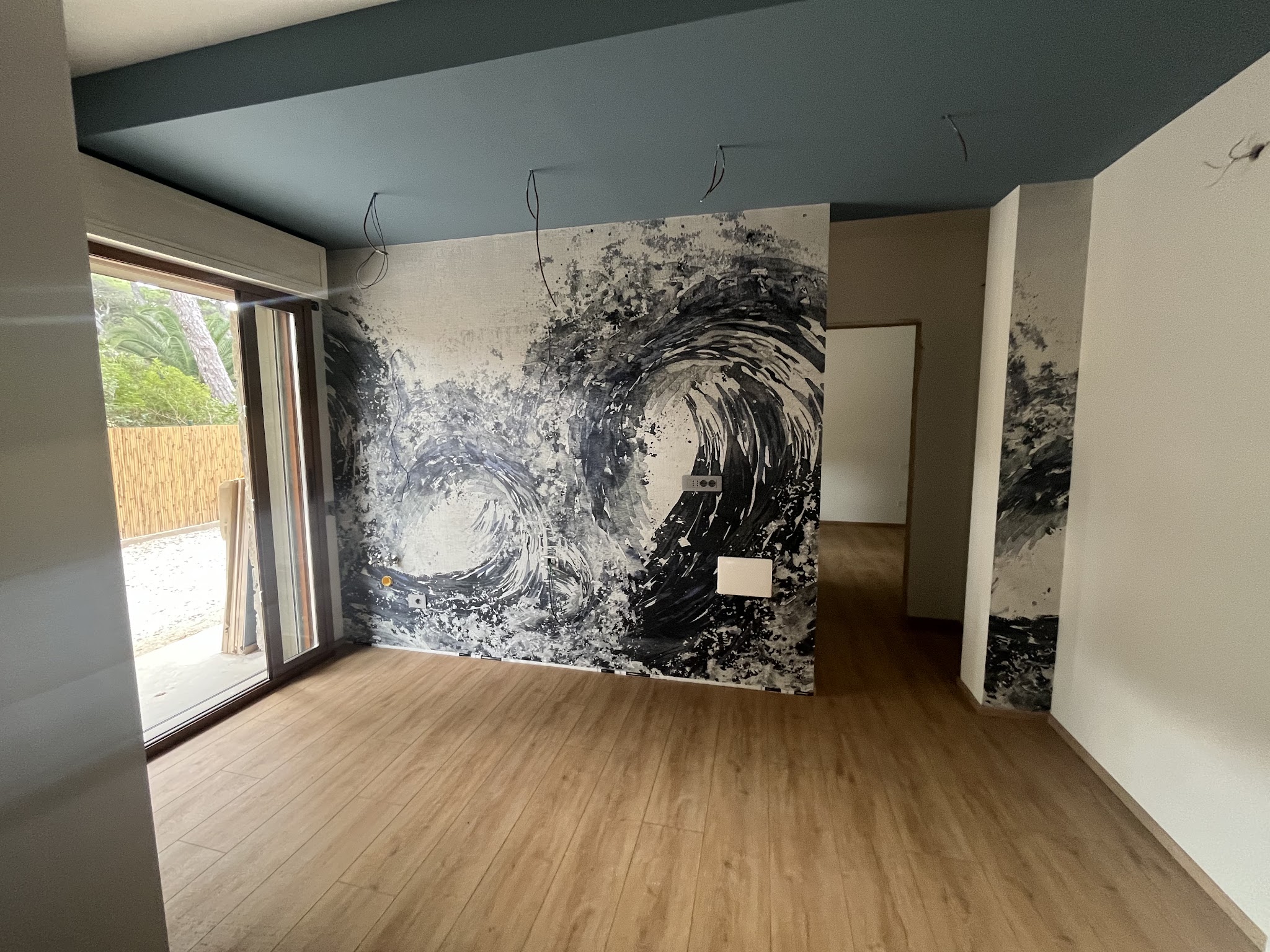 Interno con parquet e grande apertura vetrata, fotografia condivisa da una cliente Giumar